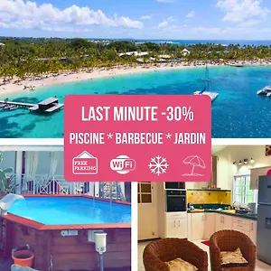 Appartement Le Sable Bleu - Evasion Tropicale A Sainte-anne - 5min - Piscine - Parking - Climatise - Vue Sur Les Palmiers - Parfait Pour Sejours En Famille Ou Entre Amis, Sainte-Anne (Grande-Terre)